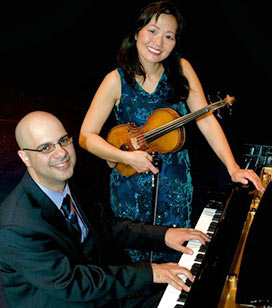 With pianist Dror Biran following a recital at the Mizel Center in Denver
